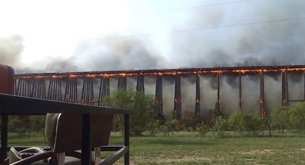 VIDEO: Fire engulfs historic wooden rail bridge