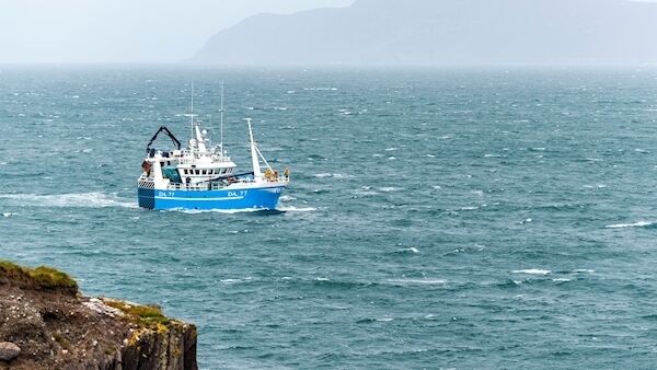 Fishermen stand on the bow of a fishing trawler as it searches the waters of Dunmanus Bay for missing fisherman Kodie Healy. Picture: Andy Gibson. Fishermen stand on the bow of a fishing trawler as it searches the waters of Dunmanus Bay for missing fisherman Kodie Healy. Picture: Andy Gibson.
