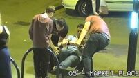 CCTV catches lads after night out - fixing bike rack