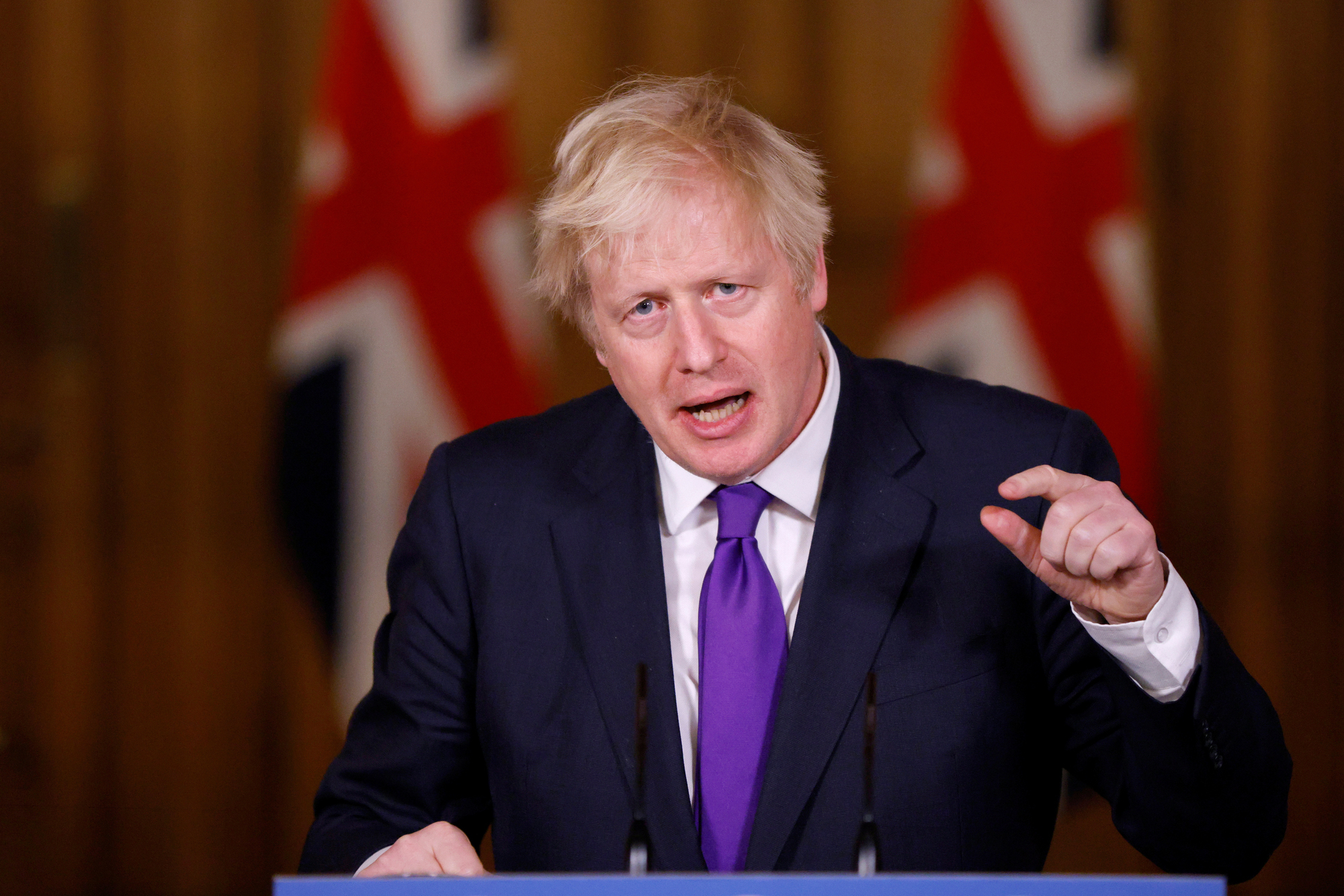 UK government defends speed of vaccine approval after US criticism