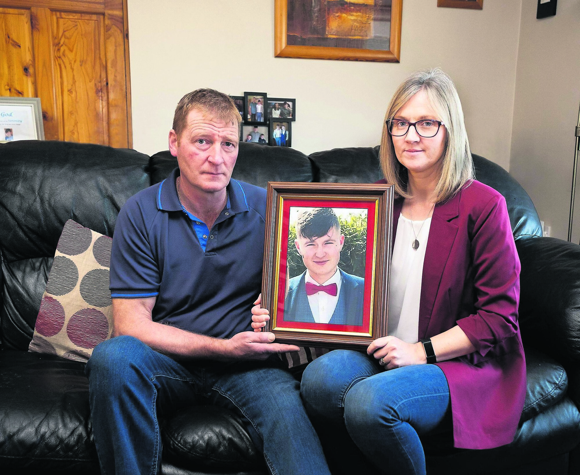 John and Johanna O’Hara with a picture of their son Niall, at their home near Granard, Co Longford. Niall took his own life in March 2019. 	Picture: Bob Morrison
            