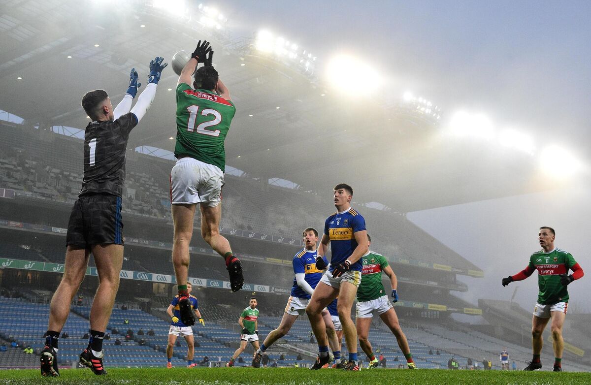 Diarmuid O'Connor scores Mayo's fourth goal despite the attentions of Tipperary goalkeeper Evan Comerford. Photo by Ramsey Cardy/Sportsfile Diarmuid O'Connor scores Mayo's fourth goal despite the attentions of Tipperary goalkeeper Evan Comerford. Photo by Ramsey Cardy/Sportsfile