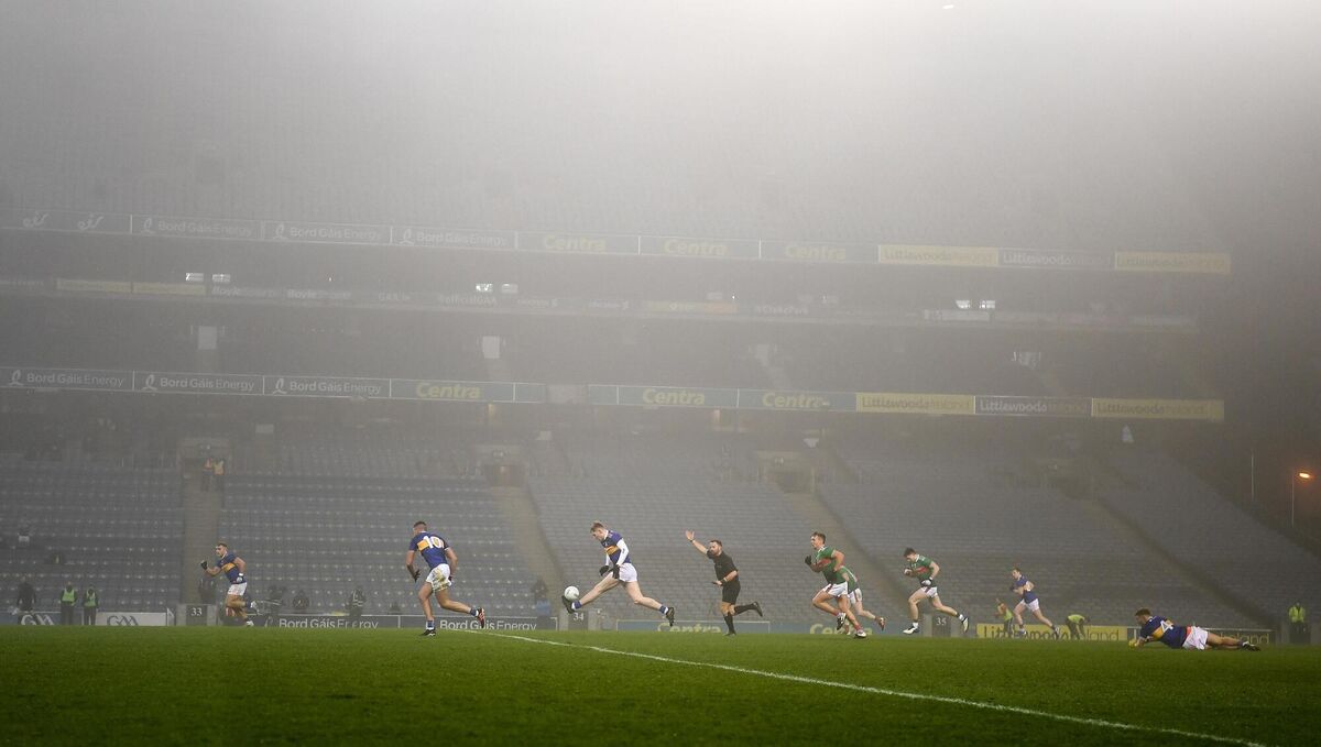 Referee David Gough waves advantage as fog descends, during the game. Picture: Ray McManus/Sportsfile Referee David Gough waves advantage as fog descends, during the game. Picture: Ray McManus/Sportsfile