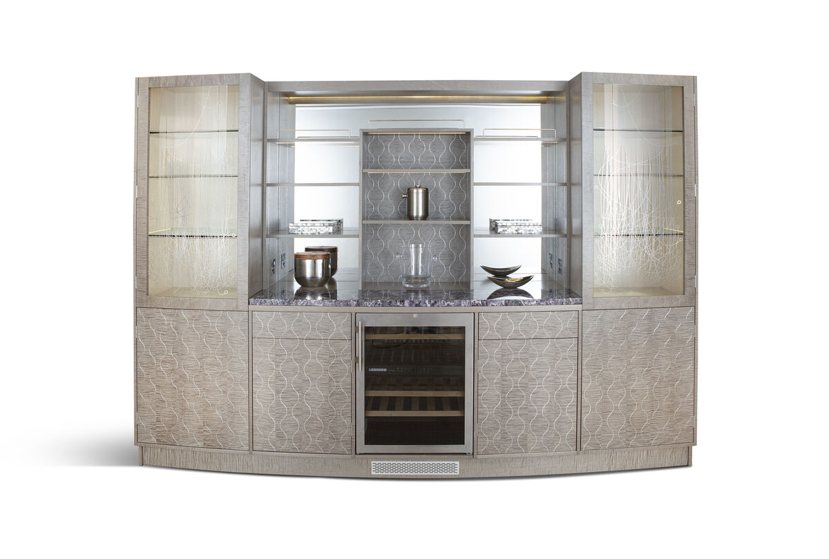 A freestanding cocktail cabinet by Zelouf and Bell at James Adam. 