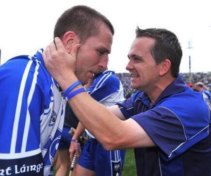 Waterford’s Ken McGrath celebrates with manager Davy Fitzgerald in 2008.