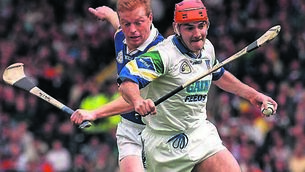 <p class="contextmenu internal_Caption">Stephen Frampton of Waterford holds off Declan Ryan of Tipperary in the Munster Senior Hurling Championship in 1998.</p>