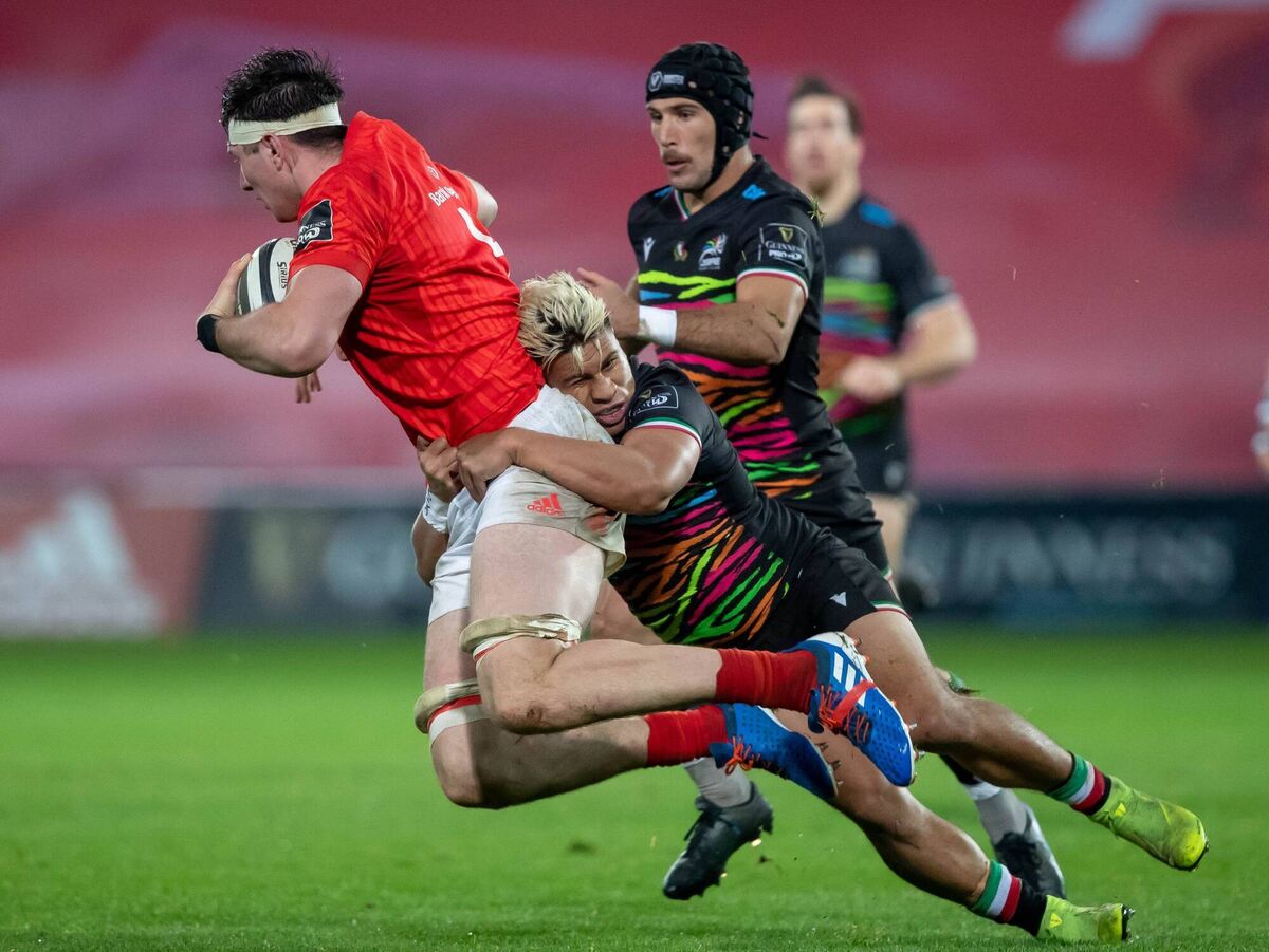 Munster’s Thomas Ahern with Junior Laloifi of Zebre during a November PRO14 clash