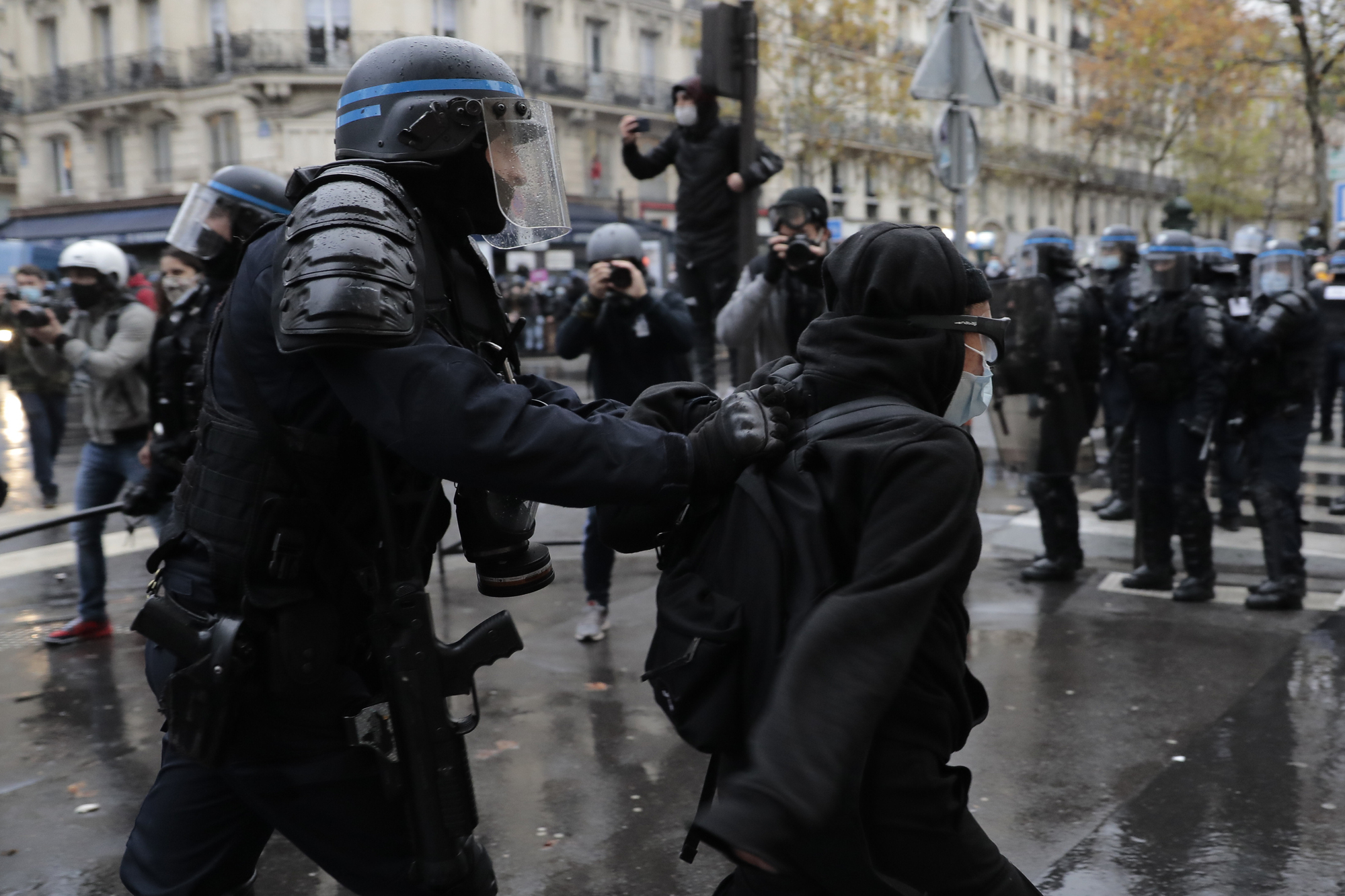Dozens arrested in Paris protest against new security law