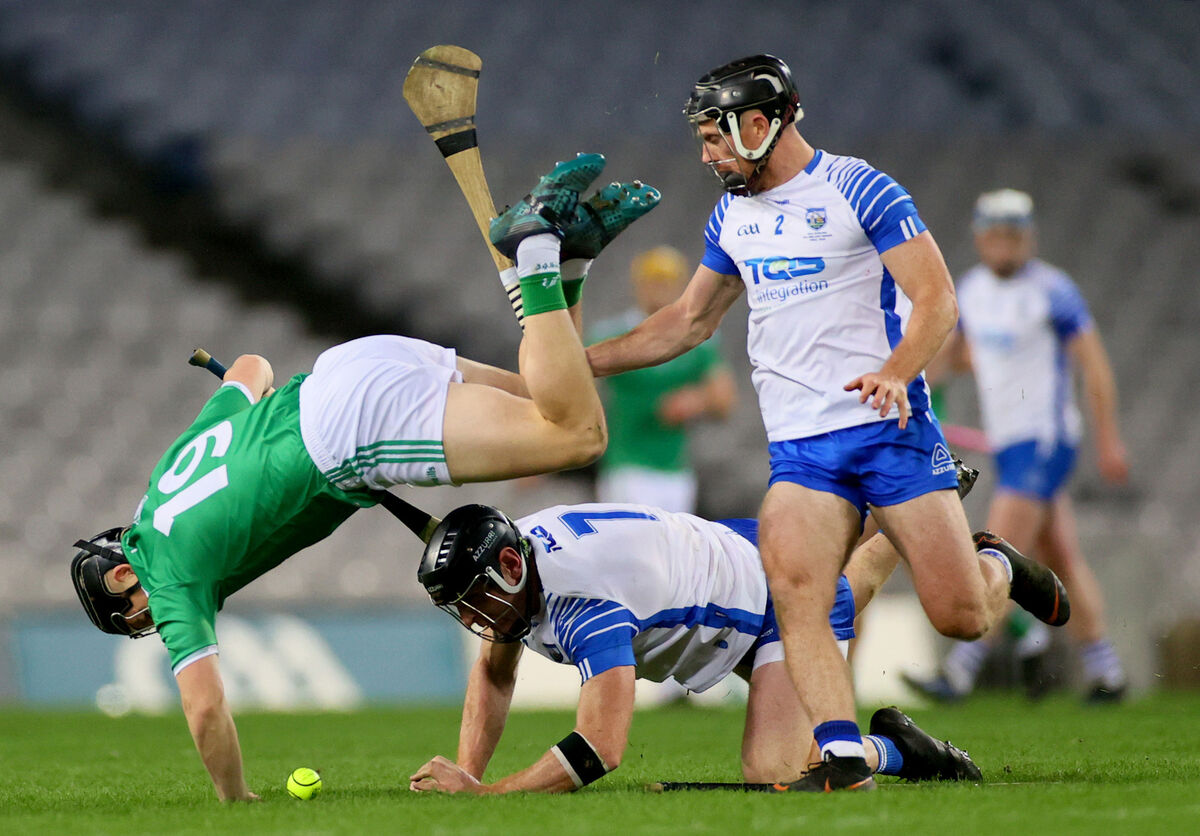 Limerick’s Peter Casey tackled by Kevin Moran and Ian Kenny of Waterford. Picture: INPHO/James Crombie Limerick’s Peter Casey tackled by Kevin Moran and Ian Kenny of Waterford. Picture: INPHO/James Crombie