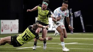 <p>Racing's Teddy Thomas is tackled by John Porch of Connacht. Picture: INPHO/Dave Winter</p>