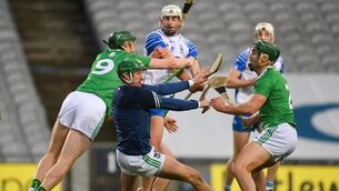 <p>Limerick players, from left, William O'Donoghue, goalkeeper Nickie Quaid and Seán Finn combine to block the shot of Neil Montgomery of Waterford during the GAA Hurling All-Ireland Senior Championship Final match between Limerick and Waterford at Croke Park in Dublin. Photo by Stephen McCarthy/Sportsfile</p>