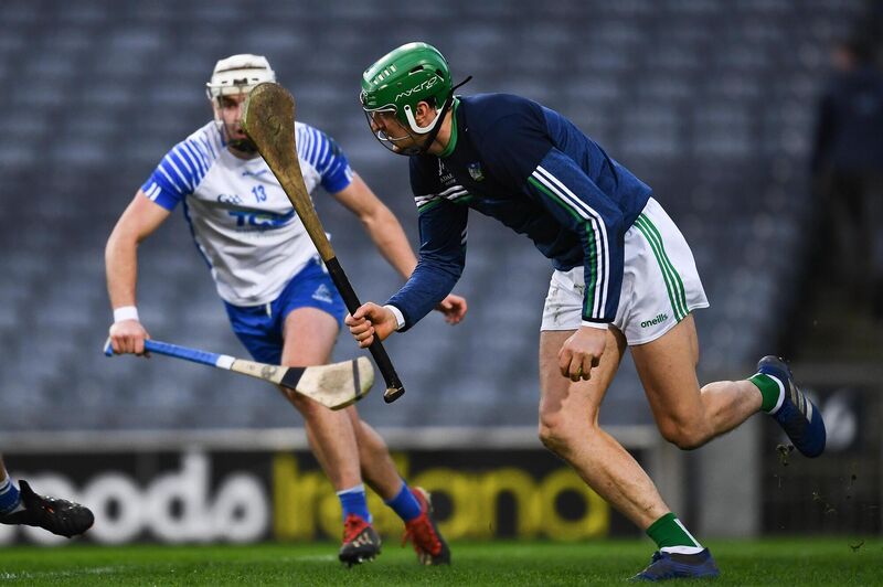 Limerick goalkeeper Nickie Quaid clears his lines ahead of Dessie Hutchinson. Picture: Ray McManus/Sportsfile