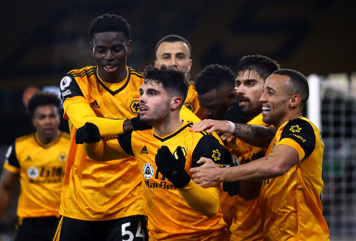 Wolverhampton Wanderers' Pedro Neto celebrates scoring his side's second goal of the game with his team-mates during the Premier League match at Molineux, Wolverhampton.