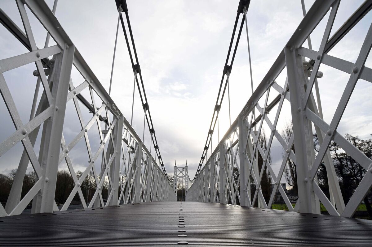 Engineers who oversaw the work on the last remaining suspension pedestrian bridge of its age and type in Ireland said they are delighted to have been able to retain the heritage structure’s famous quirk. Picture: Denis Minihane. Engineers who oversaw the work on the last remaining suspension pedestrian bridge of its age and type in Ireland said they are delighted to have been able to retain the heritage structure’s famous quirk. Picture: Denis Minihane.