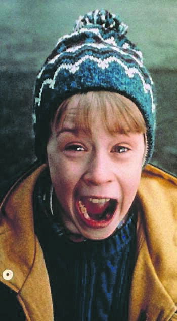 Macaulay Culkin as Kevin McCallister in Home Alone.