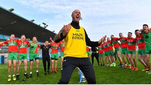 <p>FINDING THEIR VOICE: Ballymun Kickhams coach Simon Lawlor leads the singing as they celebrate their Dublin SFC final win over Ballyboden St Enda’s last September. County songs played after matches in Croke Park are not about sport and, indeed, do not even reference sport. Instead, they relate to place. <span class="contextmenu emphasis CaptionCredit">Picture: Piaras Ó Mídheach/Sportsfile</span>
            </p>