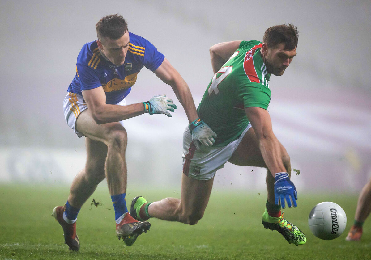 Tipperary’s Alan Campbell with Aidan O'Shea of Mayo. Picture: INPHO/Morgan Treacy
