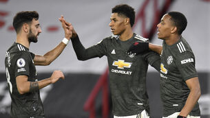 <p>Manchester United's Marcus Rashford (centre) celebrates scoring his side's third goal of the game with Bruno Fernandes (left) and Anthony Martial during the Premier League match at Bramall Lane, Sheffield.</p>