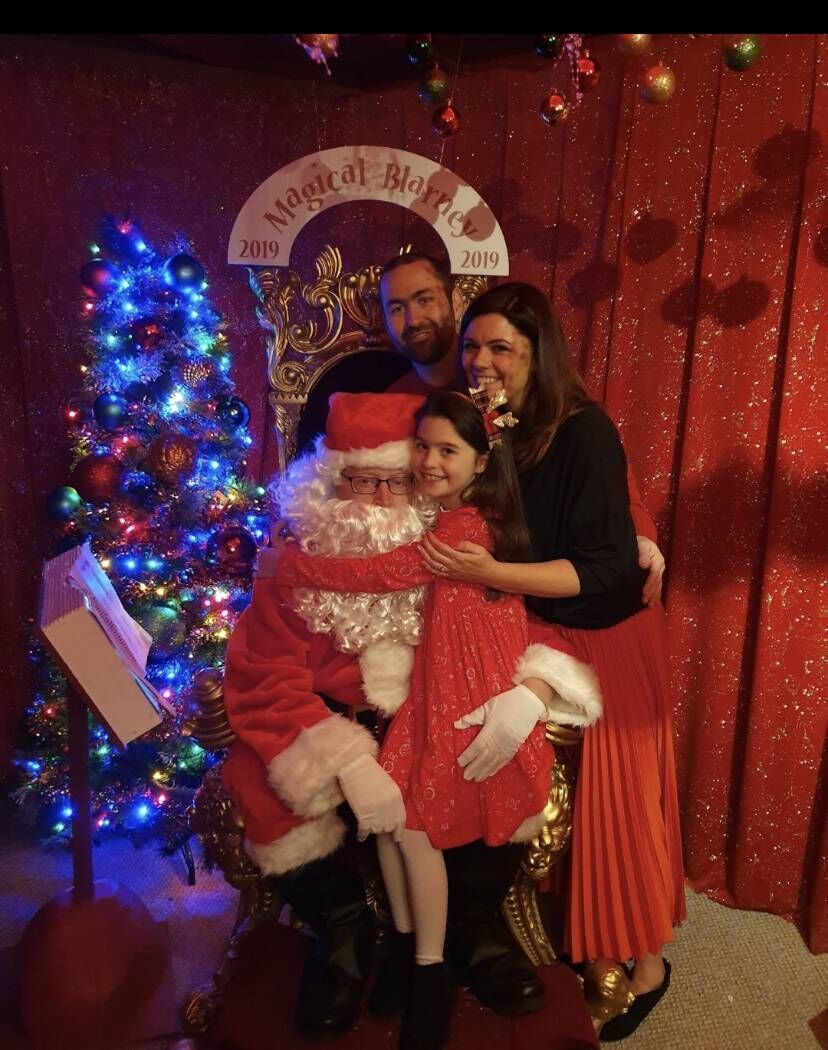 Béibhinn at Santa with her parents Eoin and Irene 