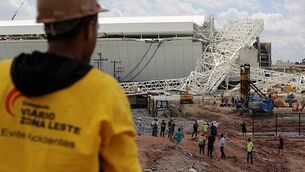 Two confirmed dead in World Cup stadium collapse