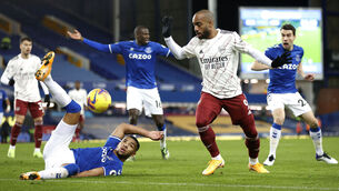 <p>REACHING OUT: Everton defender Mason Holgate, left, and Arsenal substitute Alexandre Lacazette battle for possession in Saturday’s Premier League match at Goodison Park. 	<span class="contextmenu emphasis CaptionCredit">Picture: Clive Brunskill/PA</span>
            </p>