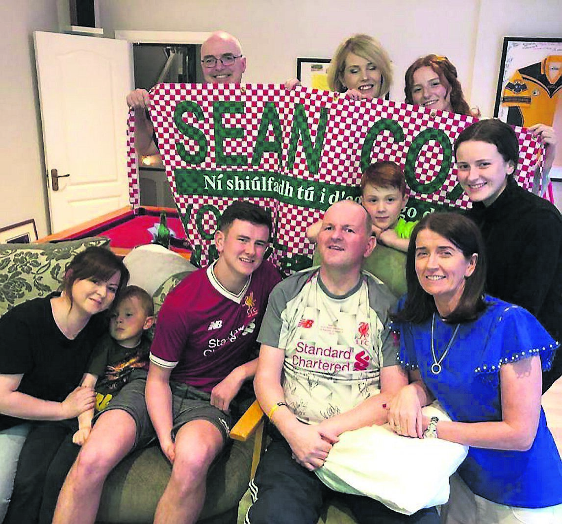 Sean Cox watching the Champions League final at home with his family. 