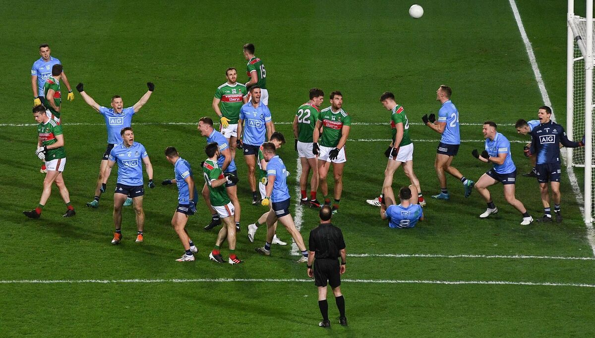 Dublin players celebrate as referee David Coldrick blows the full-time whistle at Croke Park. Photo by Stephen McCarthy/Sportsfile
