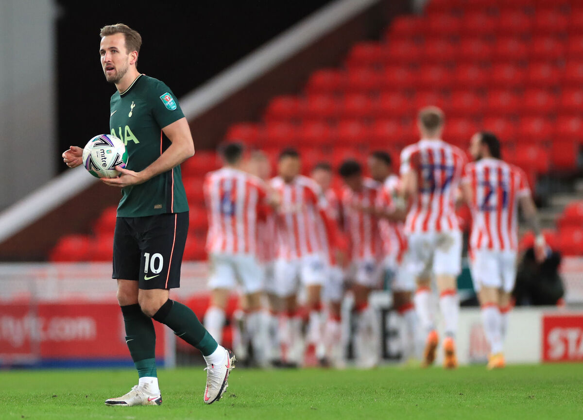 Tottenham Hotspur's Harry Kane (left) reacts after Stoke City's Jordan Thompson (background) scores during the Carabao Cup tie. Tottenham Hotspur's Harry Kane (left) reacts after Stoke City's Jordan Thompson (background) scores during the Carabao Cup tie.