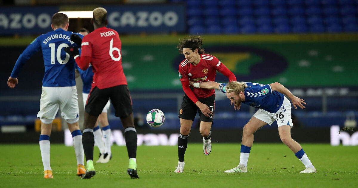 Everton's Tom Davies (right) and Manchester United's Edinson Cavani battle for the ball during the Carabao Cup clash. Picture: Nick Potts/PA Wire.