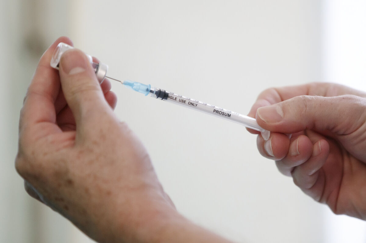 A Pfizer-BioNTech vaccine is prepared at a vaccination centre in York. 