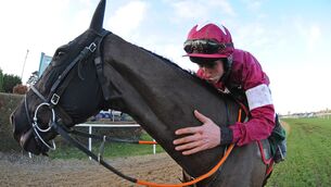 <p>Delta Work gets a hug from jockey Jack Kennedy after their Paddy Power Irish Gold Cup win at Leopardstown in February. Photo: Healy Racing.</p>