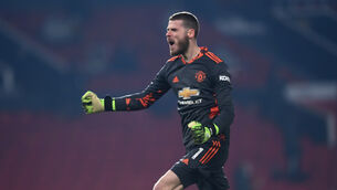 <p>David De Gea celebrates Manchester United’s late win against Wolves (Laurence Griffiths/PA)</p>