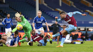 <p>West Ham United's Manuel Lanzini has a shot on goal at Goodison Park. Picture: Alex Pantling/PA</p>