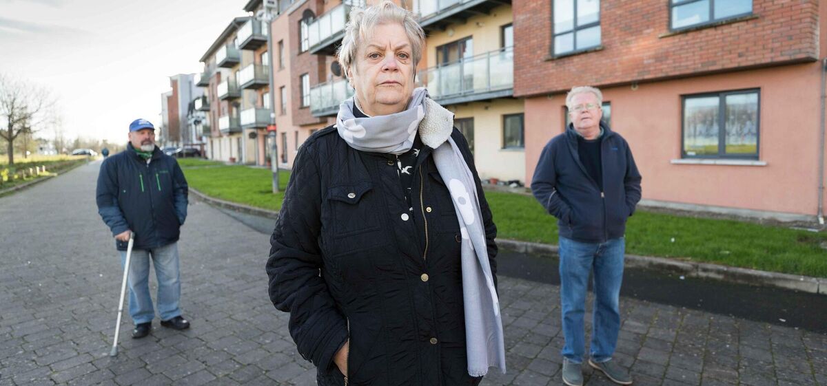 Residents Lorraine Carew with Eugene O'Byrne (left) and John O'Brien. None of these people ran up debts through flagrant spending, bad investments or living beyond their means. Picture: Eamon Ward