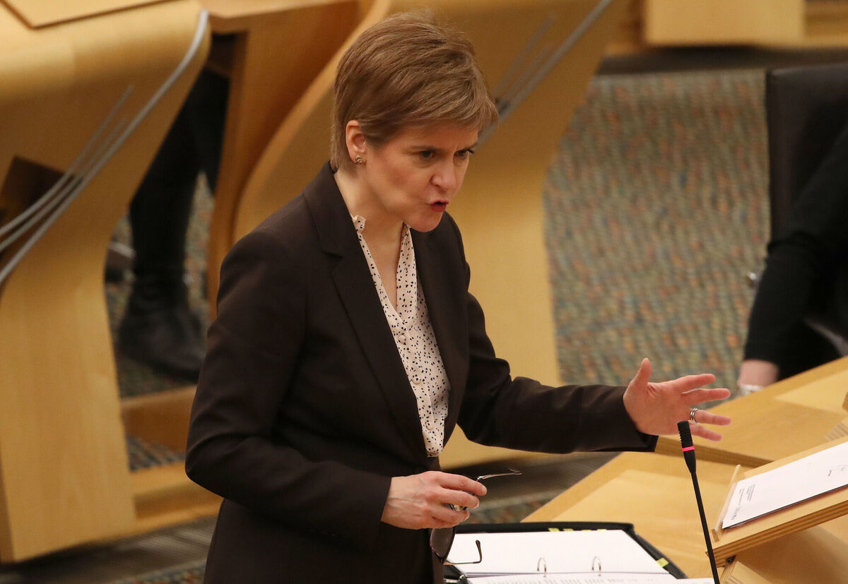 First Minister Nicola Sturgeon reacts as she delivers a statement at Holyrood, Edinburgh, announcing that Scotland will be placed in lockdown from midnight for the duration of January with a legal requirement to stay at home except for essential purposes. Picture: Andrew Milligan/PA Wire