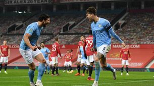 <p>John Stones of Manchester City celebrates with Ruben Dias of Manchester City after scoring his sides first goal during the Carabao Cup semi-final. Picture: Shaun Botterill/Getty Images</p>
