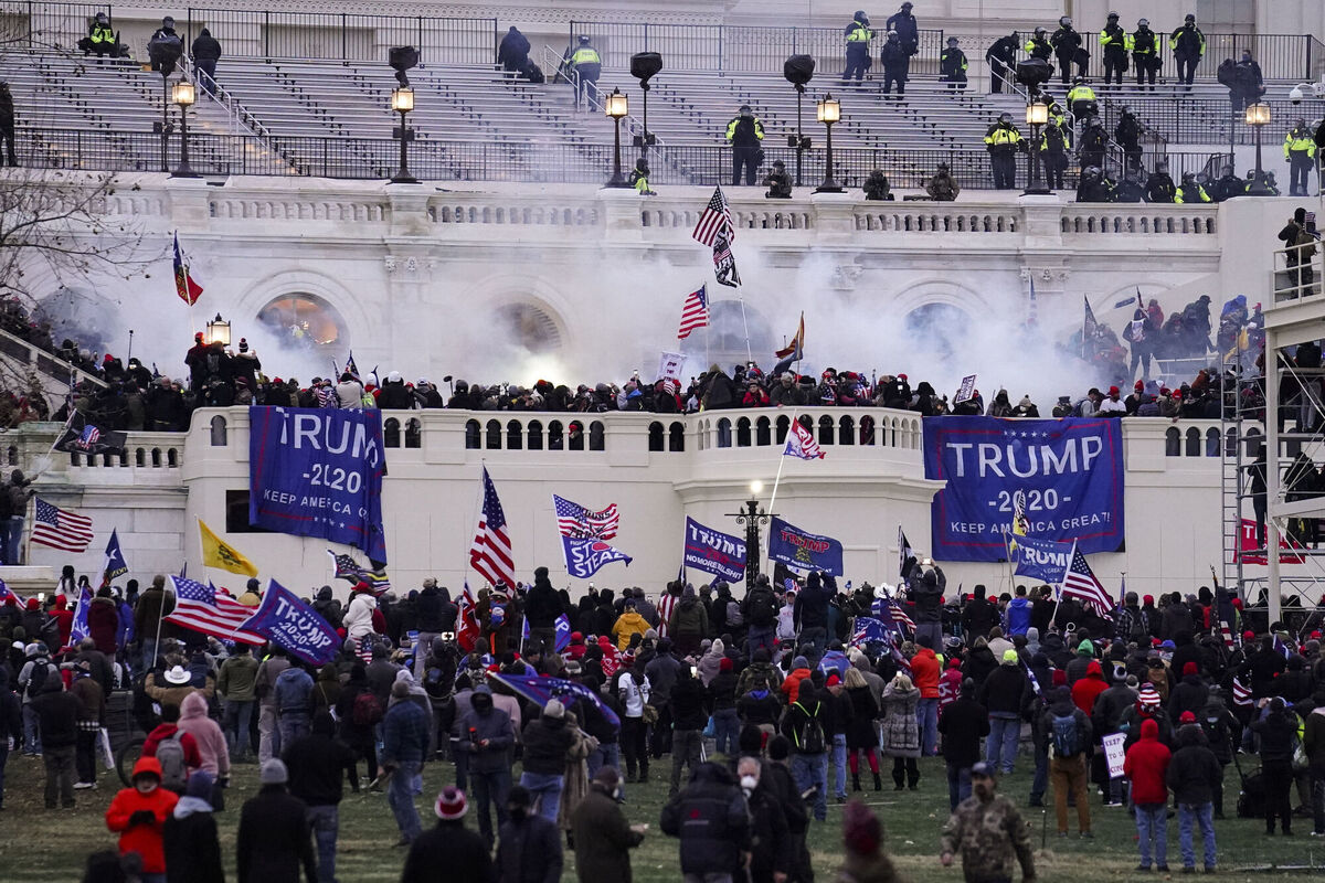 Violent protesters, loyal to President Donald Trump, storm the Capitol, Wednesday, Jan. 6, 2021, in Washington. Picture: AP Photo/John Minchillo