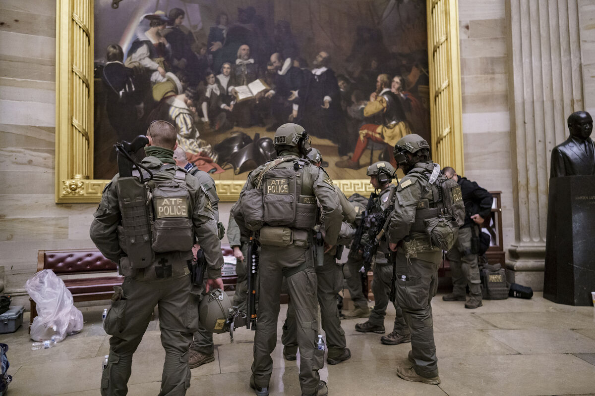 After violent protesters loyal to President Donald Trump stormed the U.S. Capitol today, a tactical team with ATF gathers in the Rotunda to provide security for the continuation of the joint session of the House and Senate to count the Electoral College votes cast in November's election, at the Capitol in Washington, Wednesday, Jan. 6, 2021. Picture: AP Photo/J. Scott Applewhite