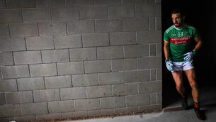 <p>Tom Parsons bursts out of the dressing room ahead of the All-Ireland SFC quarter-final against Donegal in Castlebar in August 2019. Parsons battled back on to the Mayo panel that season, a year after a horrific leg injury had threatened to end his career. <span class="contextmenu emphasis CaptionCredit">Picture: Inpho/Ryan Byrne</span>
            </p>