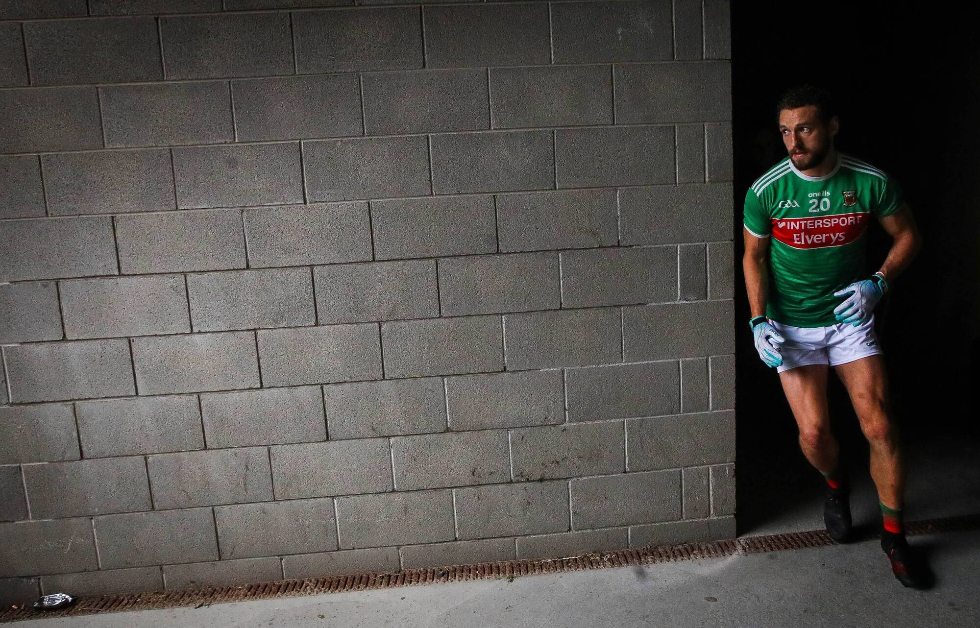Tom Parsons bursts out of the dressing room ahead of the All-Ireland SFC quarter-final against Donegal in Castlebar in August 2019. Parsons battled back on to the Mayo panel that season, a year after a horrific leg injury had threatened to end his career. Picture: Inpho/Ryan Byrne
            