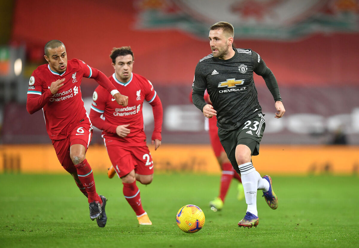 Liverpool's Thiago Alcantara (left) and Manchester United's Luke Shaw in action. Picture: Paul Ellis