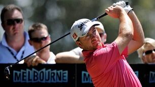 Day leads Melbourne World Cup as McDowell in contention