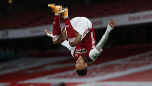 <p>JUMPING FOR JOY: Pierre-Emerick Aubameyang celebrates in style after scoring Arsenal’s first goal against Newcastle at the Emirates Stadium. 	Picture: Catherine Ivill/PA</p>