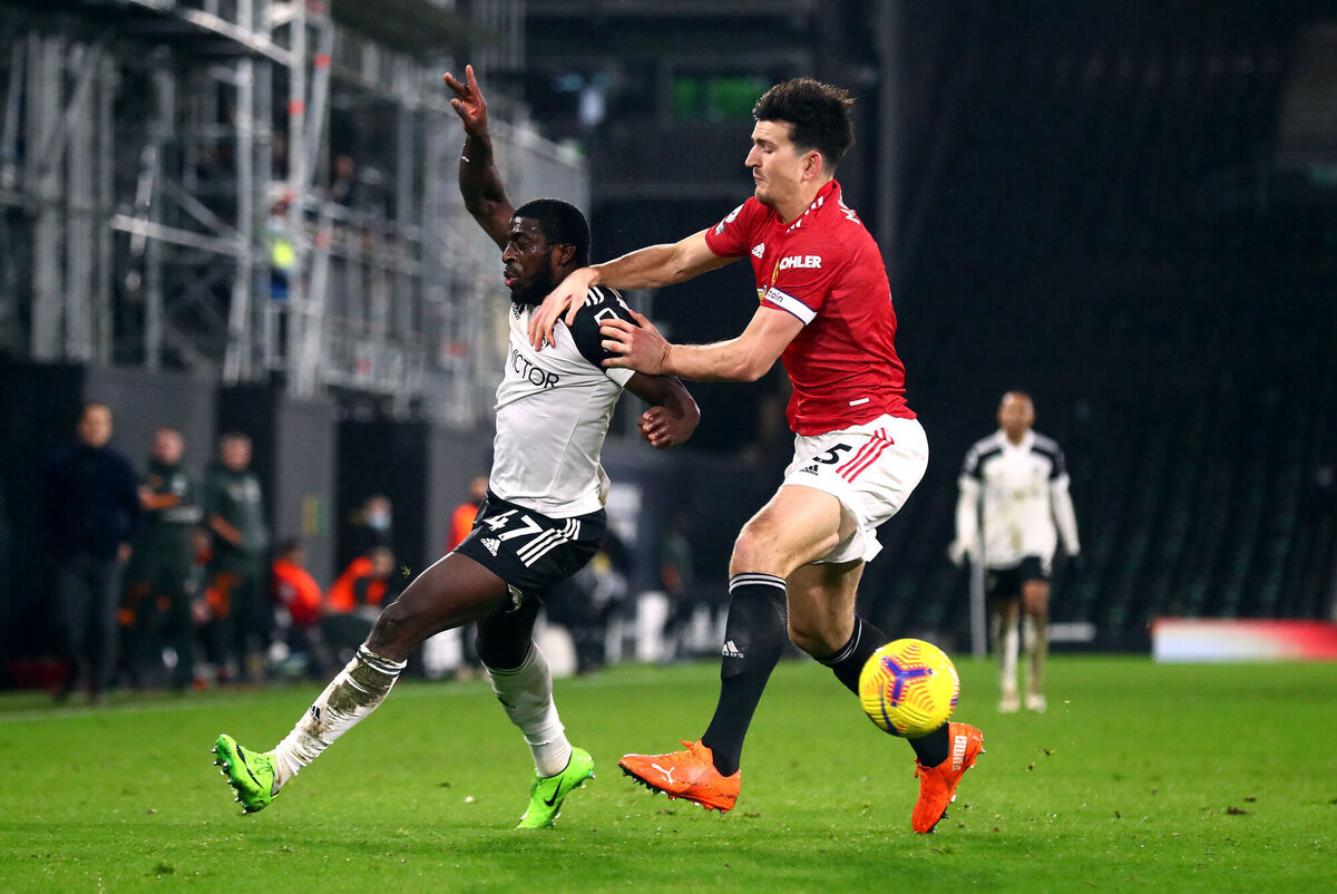 Fulham’s Aboubakar Kamara (left) and Manchester United's Harry Maguire battle for the ball. Picture: Clive Rose