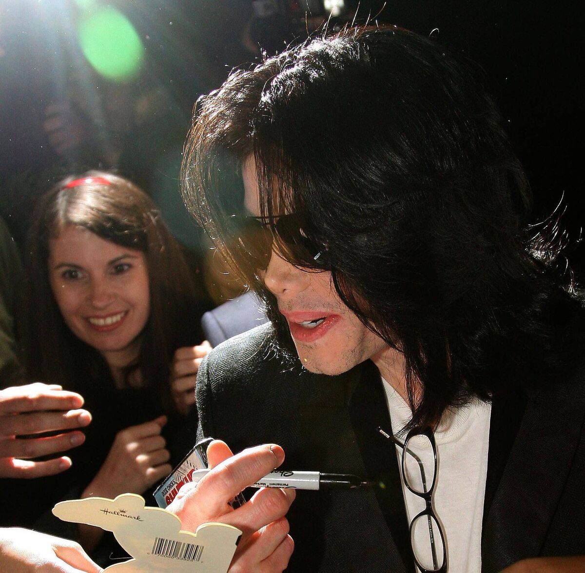 Talitha Linehan with Michael Jackson as he greets some fans at his hotel in Bel Air in October 2008.