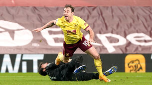 <p>Liverpool goalkeeper Alisson concedes a penalty for a challenge on Burnley’s Ashley Barnes. Picture: Jon Super</p>