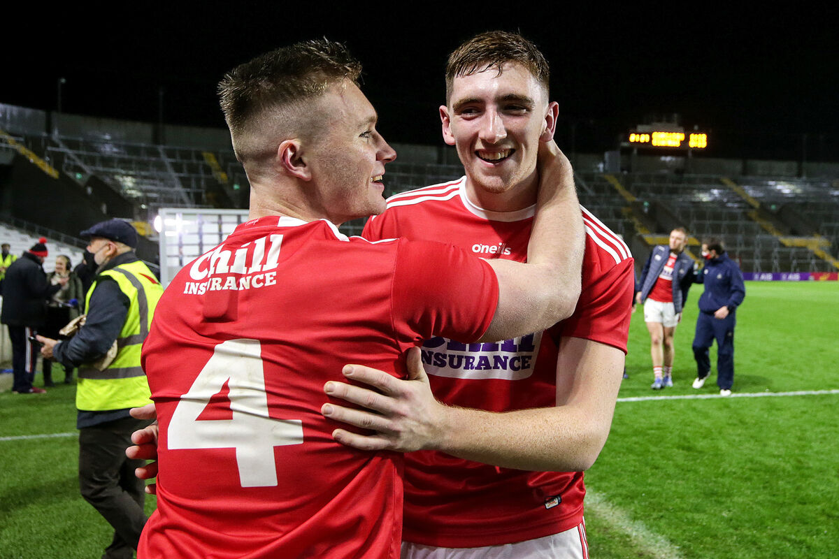 Cork's Kevin Flahive celebrates with Mark Keane. Picture: INPHO/Laszlo Geczo