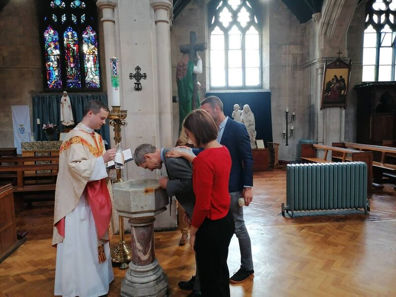 Robert Freese being baptised with godparents Justyna and Stephen Flynn (Happy Pear) and Fr Conor McDonough.