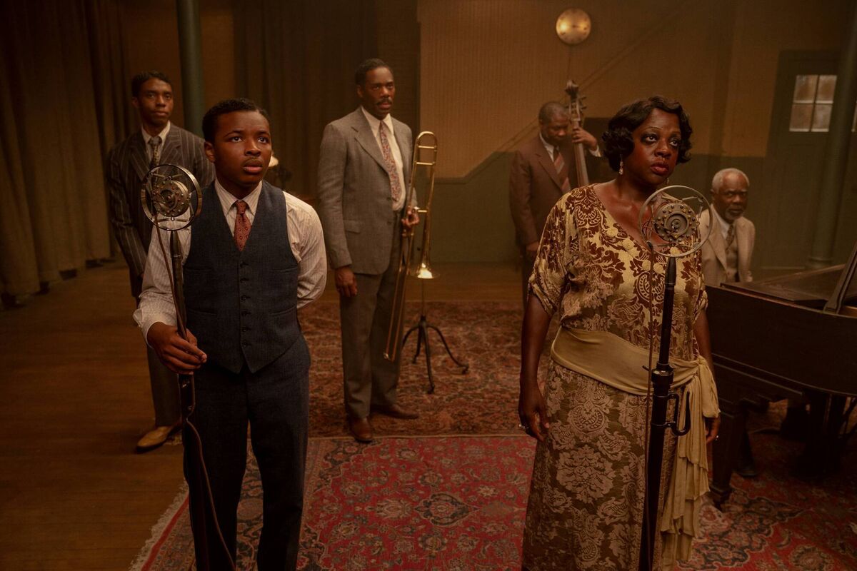 Ma Rainey's Black Bottom (2020): (L to R) Chadwick Boseman ("Levee"), Dusan Brown ("Sylvester"), Colman Domingo ("Cutler"), Michael Potts ("Slow Drag"), Viola Davis ("Ma Rainey"), Glynn Turman ("Toldeo").Picture: David Lee / Netflix Ma Rainey's Black Bottom (2020): (L to R) Chadwick Boseman ("Levee"), Dusan Brown ("Sylvester"), Colman Domingo ("Cutler"), Michael Potts ("Slow Drag"), Viola Davis ("Ma Rainey"), Glynn Turman ("Toldeo").Picture: David Lee / Netflix