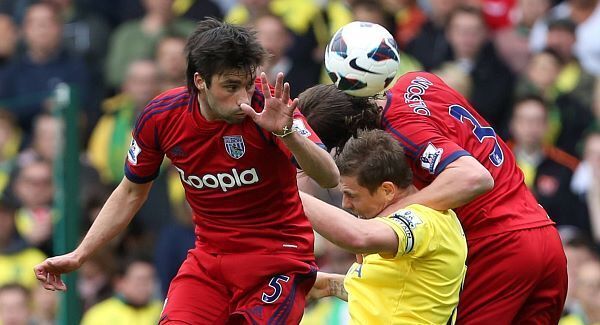 Norwich brush Baggies aside to remain in Premier League